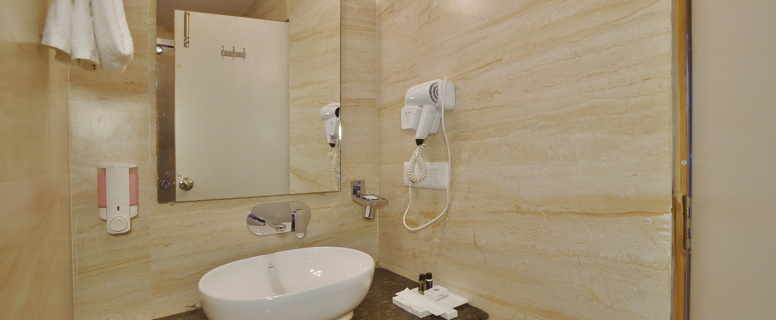 Vanity area of Deluxe Room at DLS Highland Resort and Spa, Mussoorie.